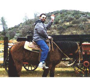 Eugene rides a horse, Thunderbolt, in California, Winter 1994